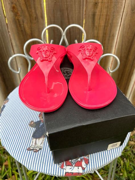 versace pink flip flops